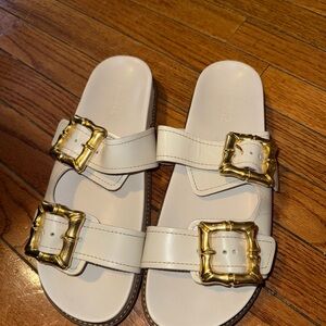 SCHUTZ White Sandals with Gold Buckles